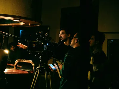 Crew behind the camera on a night shoot