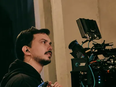 Ario beside the cinema camera